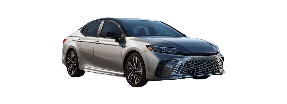 A side view of Toyota Camry parked in an outdoor carpark.