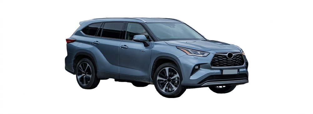 A dark grey Toyota Kluger parked in an outdoor setting with grass visible behind the car.