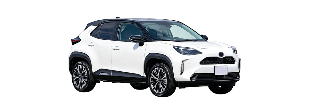 Side view of a white Yaris Cross parked in an outdoor carpark.